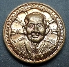 131  เหรียญกลมเล็ก  ที่ระลึก อายุครบ ๙๙ ปี  หลวงปู่ บุดดา  ถาวโร  จ.สิงห์บุรี